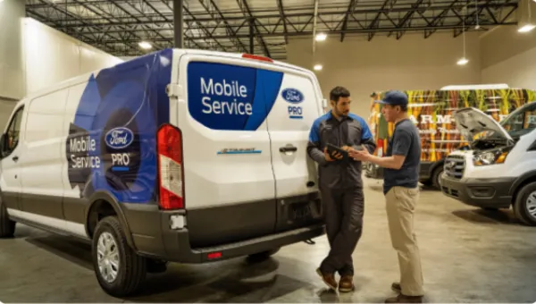 Ford mobile service technicians in a service bay